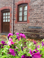 Flowers and the cottage door